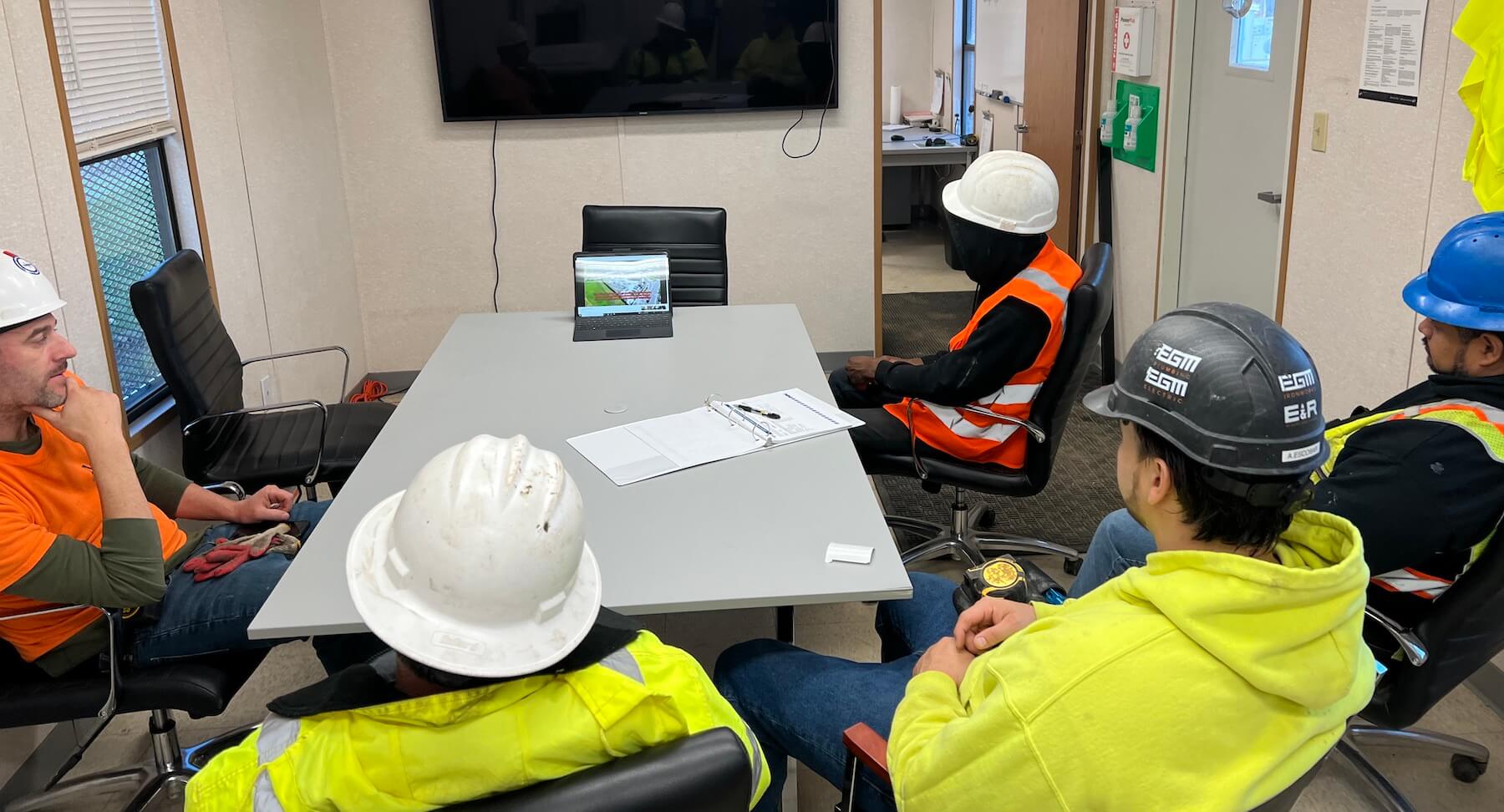 Commerical plumbing crew meeting